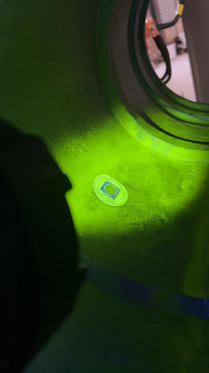 Test piece on the inner face of a large ring under UV-A light